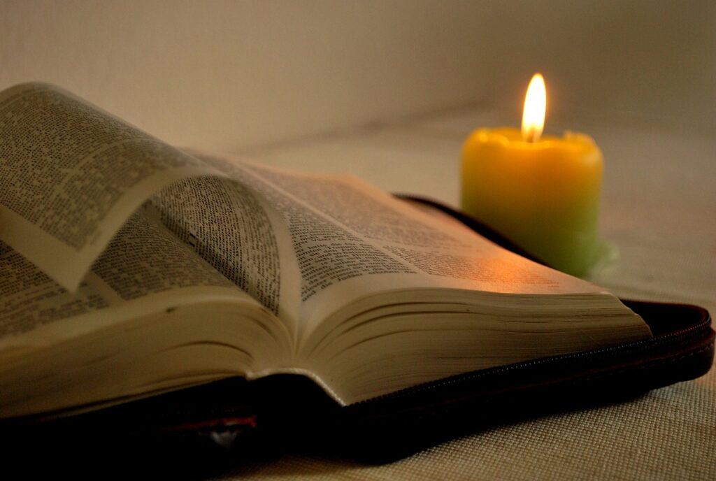 read, a book, candle, bible, bible, bible, bible, bible, bible